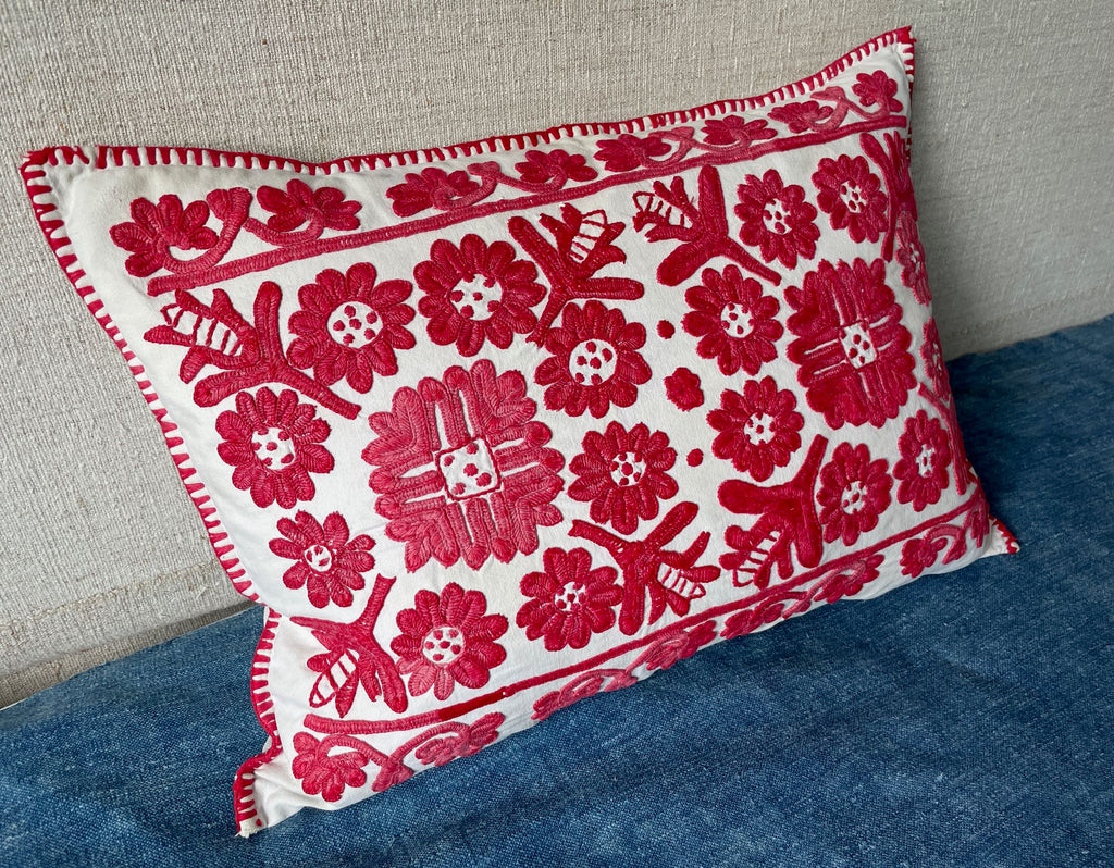 hand embroidered irasos cushion vintage folk textile pillow in raspberry red on cream linen