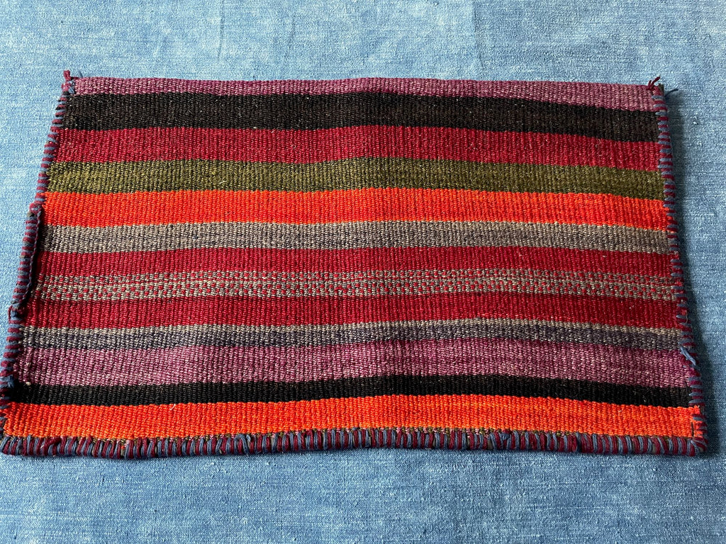 striped red orange black mat in wool middle east salt carrier or use as cushion asia textiles