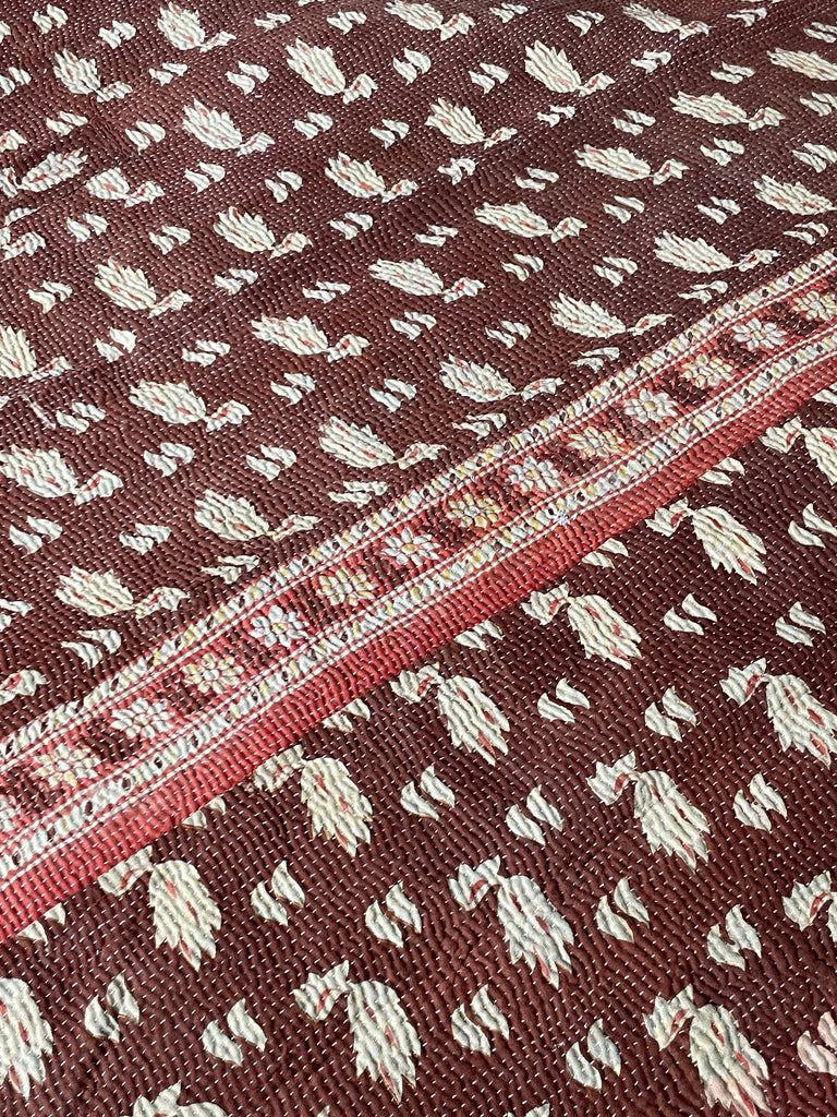 green red black geometric patterned kantha quilt bedspread or sofa throw. Reversible and washable.