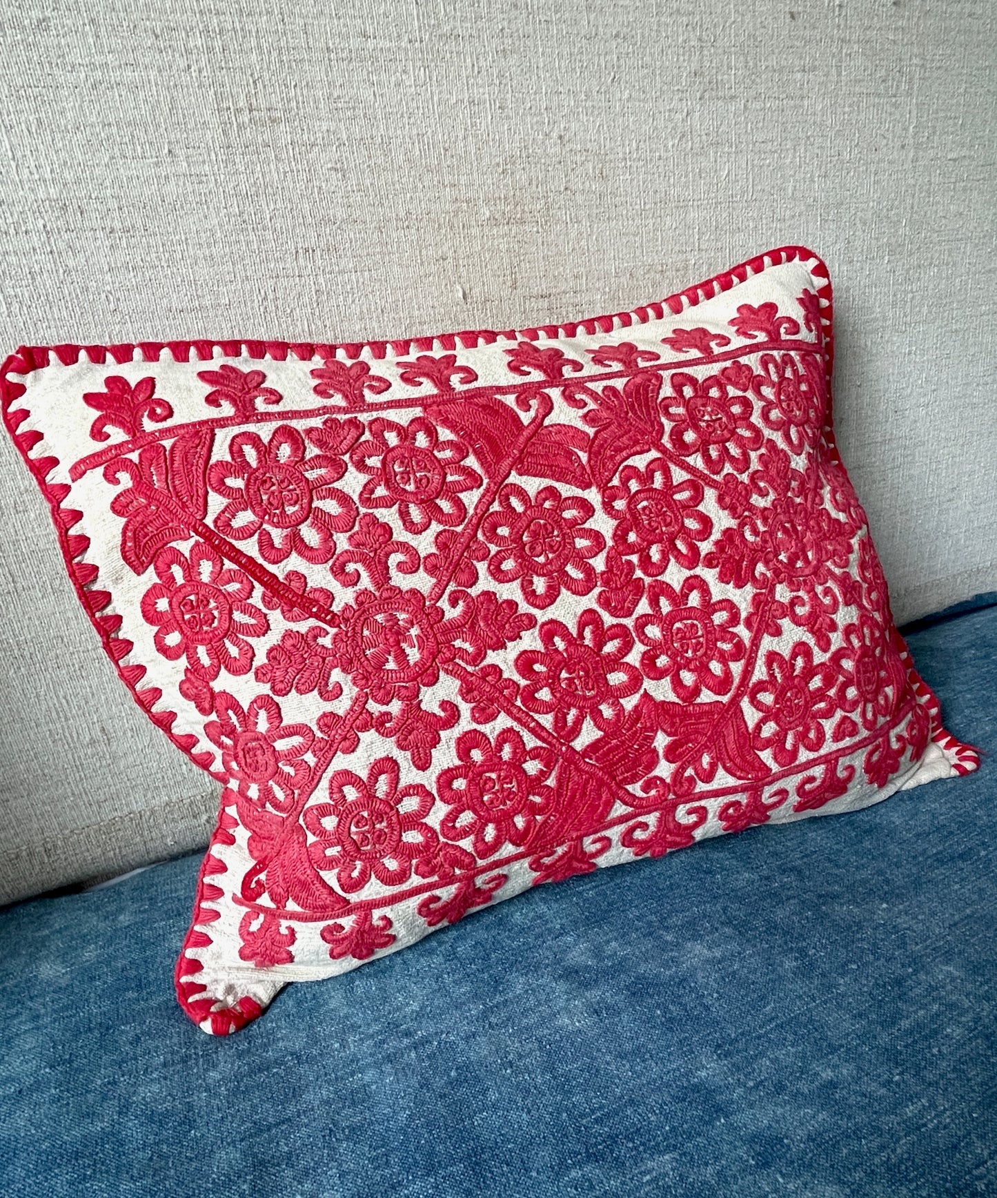 
                  
                    vintage embroidered irasos cushion folk art pillow in red on white background free uk delivery
                  
                