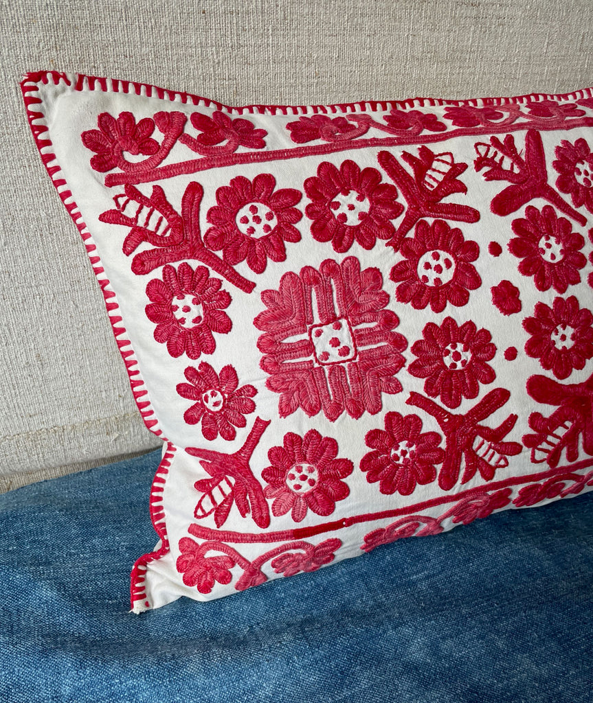 hand embroidered irasos cushion vintage folk textile pillow in raspberry red on cream linen 