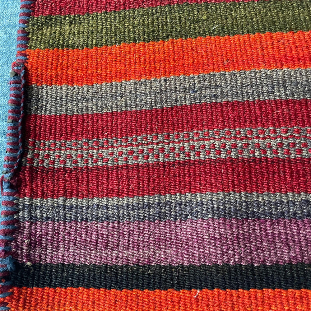 
                  
                    striped red orange black mat in wool middle east salt carrier or use as cushion asia textiles
                  
                