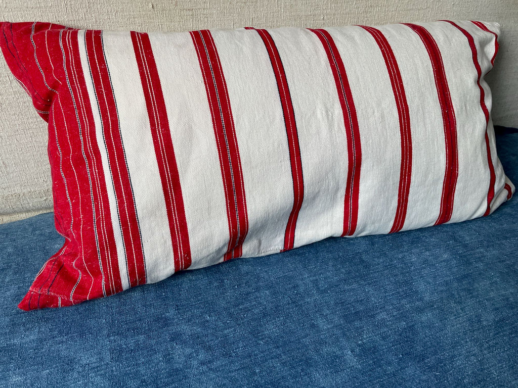 vintage striped large pillow cushion with feather pad in red and white stripes and button closure