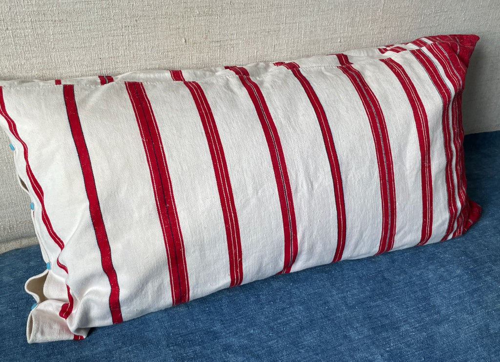 vintage striped large pillow cushion with feather pad in red and white stripes and button closure